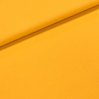 Bavlněný úplet UNI ZITA 23 jednobarevný tmavě žlutý, š.185cm (látka v metráži)