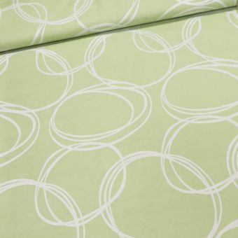 Dekorační závěs, krémové kruhy na zelené, šířka 140cm (látka v metráži)