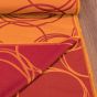 Dekorační závěs, vínové  kruhy na oranžové, šířka 140cm (látka v metráži)