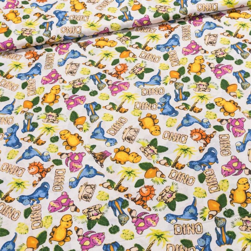 Bavlněné plátno dětské POLO malí dinosauři s nápisy DINO, š.140cm (látka v metráži)
